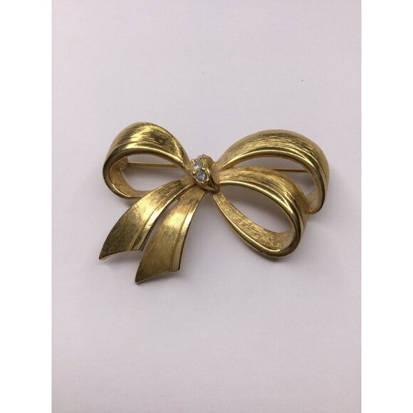 Vintage Avon Gold Tone Rhinestone Brooch Pin Ribbon Bow Designer Jewelry - Picture 1 of 9
